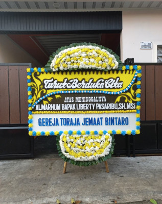 Papan Bunga Duka di Ulunoyo